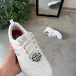 Skechers arbete i andningsbart material för kvinnor.