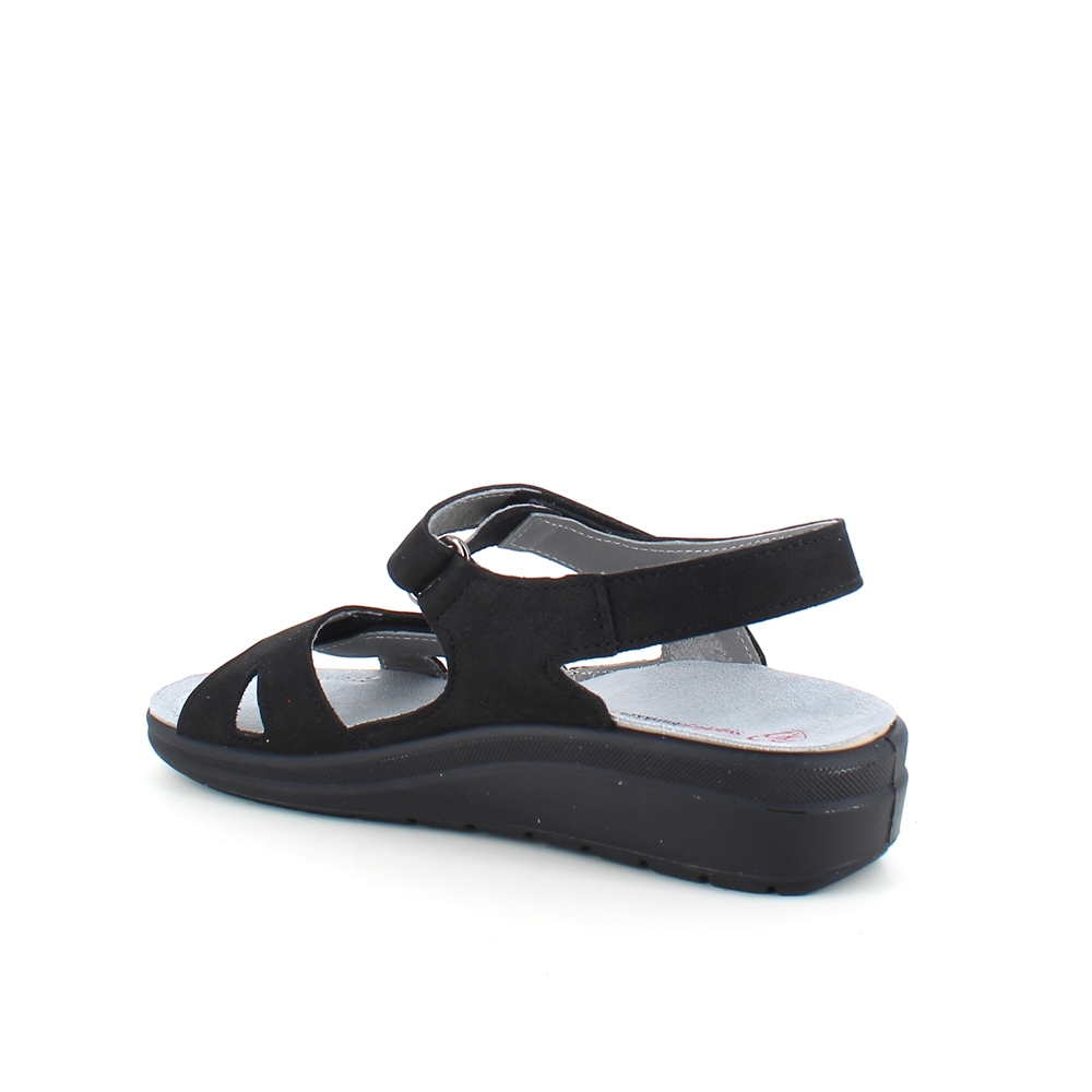 Stötdämpande svart sandal med avtagbar sula.