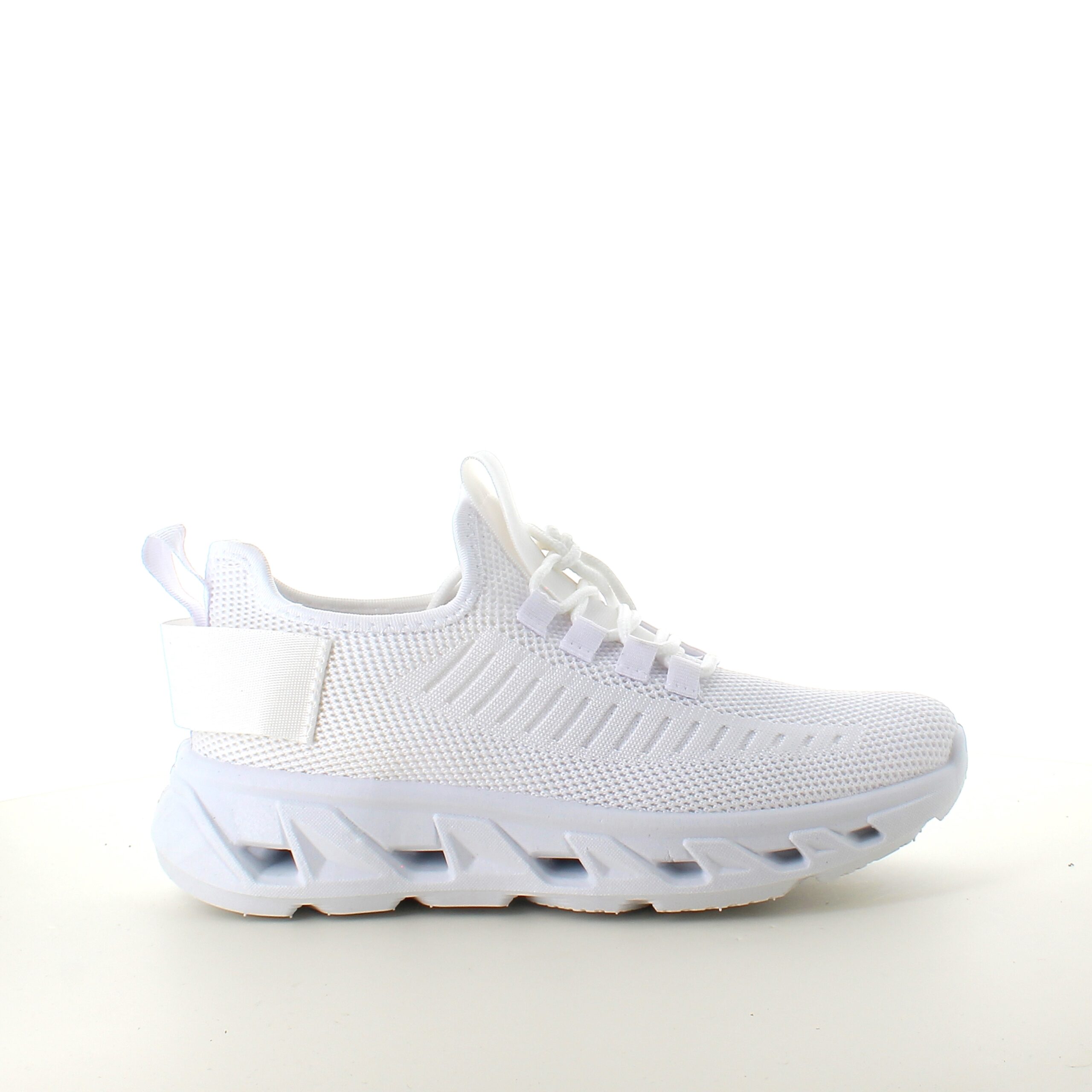 Vita slip-on skor med stickad ovandel