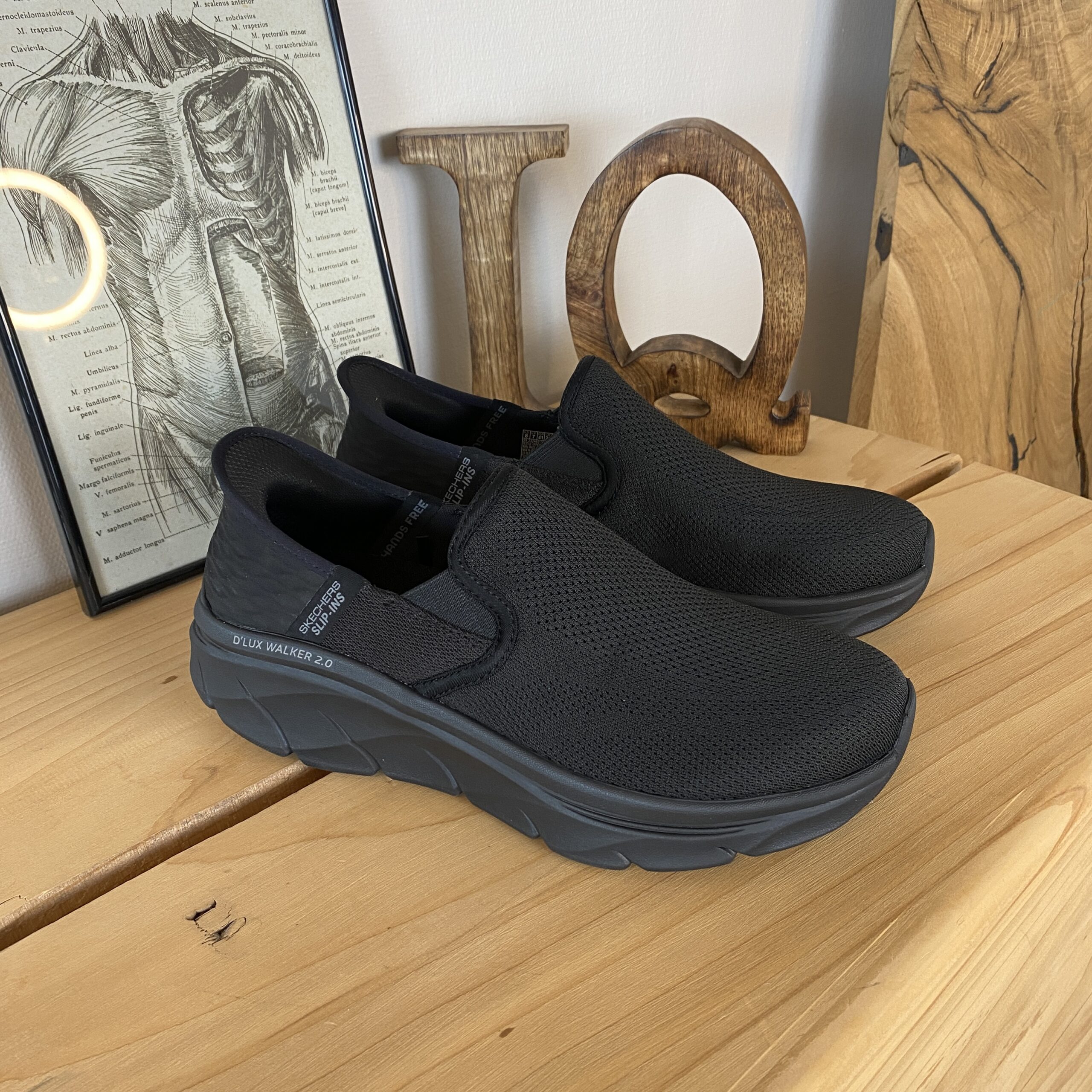 Svart herr slip-in sko från Skechers